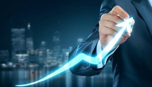 man-showing-improved-performance-chart